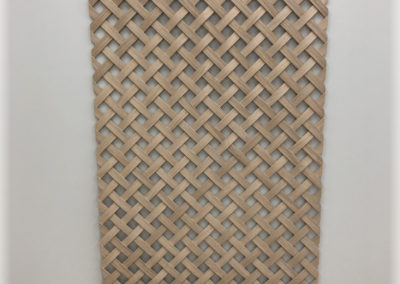 Cache-radiateur en tressé.